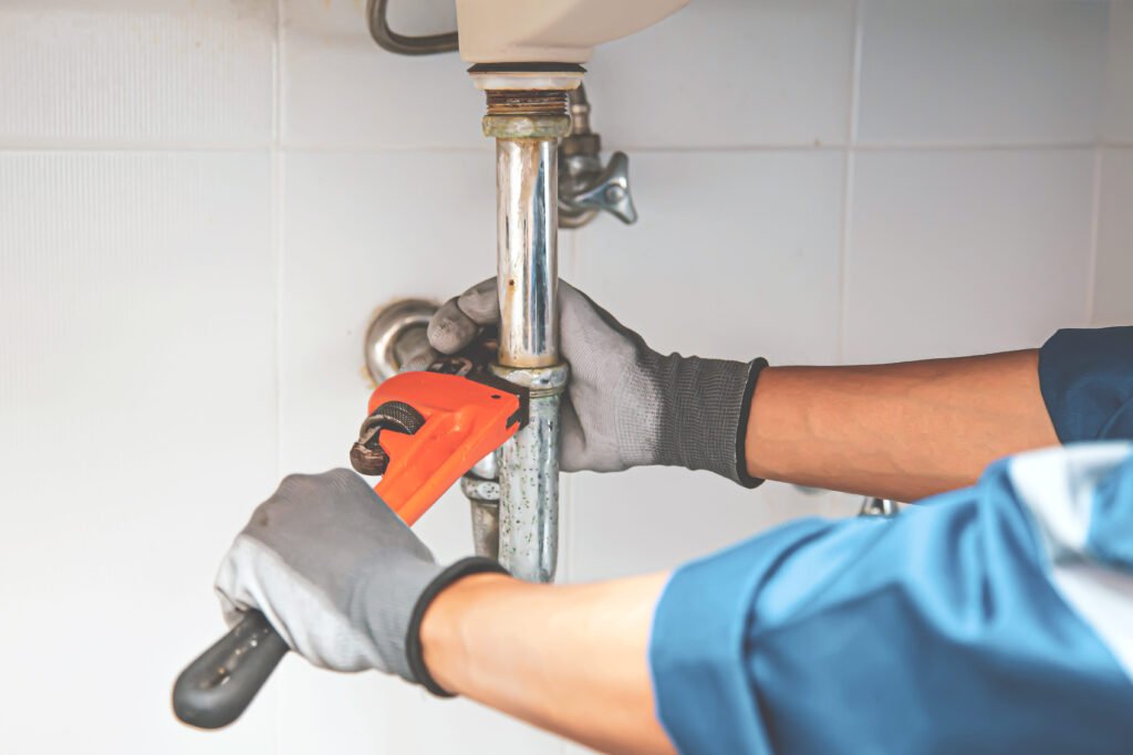 technician-plumber-using-wrench-repair-water-pipe-sink(1)